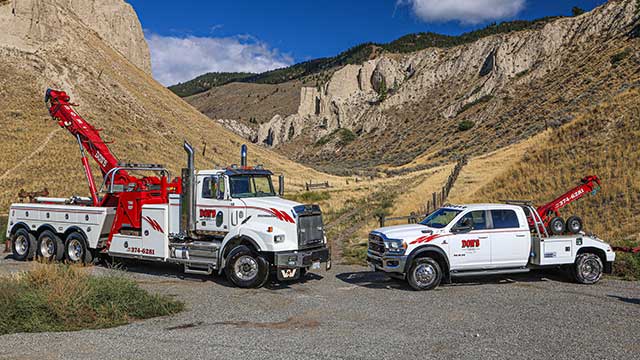 Dons Towing 2 trucks side view