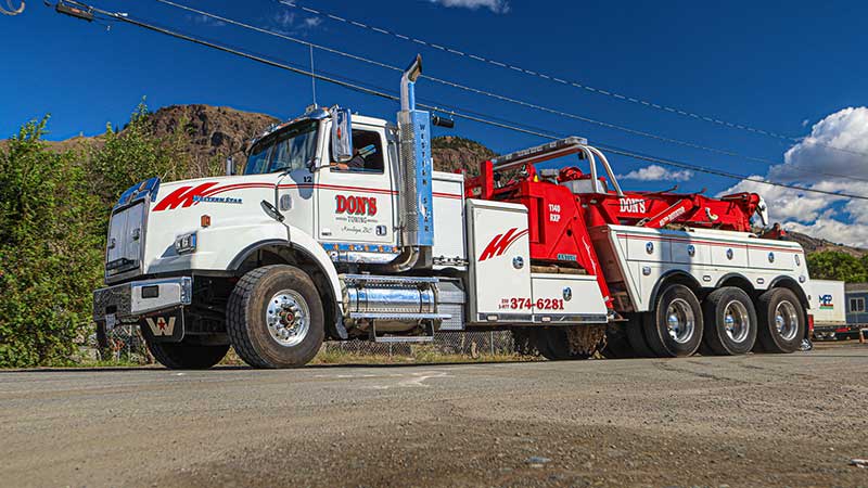 Dons Towing large truck on site